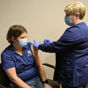Dr. Nykki getting her first Covid-19 shot